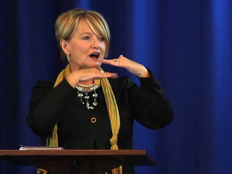 Sherry Poundstone speaking at an event